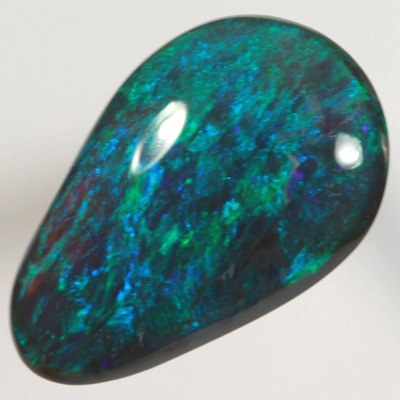 SOLID BLACK OPAL Full on green and blue fire always  SEE VIDEO